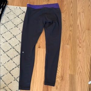 Grey Lululemon leggings with purple waist ban